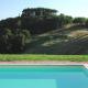 Siena: gerestaureerd landhuis met 14 ha grond